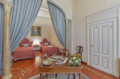 Letto o letti in una camera di Maggio Palace by VacaVilla