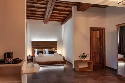 Letto o letti in una camera di Oro Nero Florence