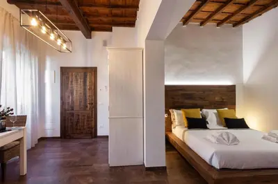 Letto o letti in una camera di Oro Nero Florence