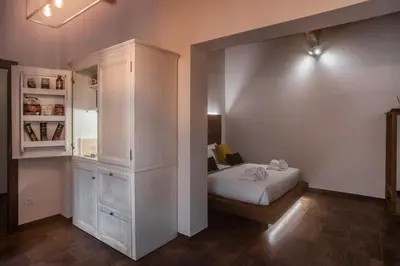 Letto o letti in una camera di Oro Nero Florence