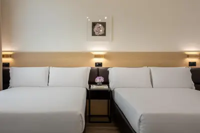 Letto o letti in una camera di Globus Urban Hotel