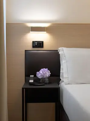 Letto o letti in una camera di Globus Urban Hotel