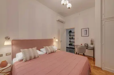 Letto o letti in una camera di Apartments Florence - Golden Tower with View