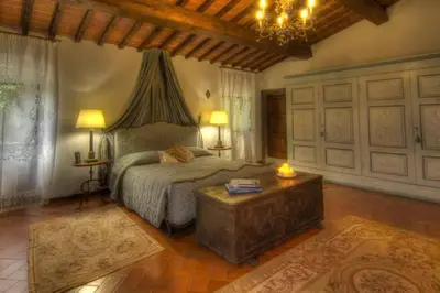 Letto o letti in una camera di Villa Selva
