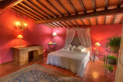 Letto o letti in una camera di Villa Selva