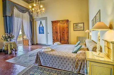 Letto o letti in una camera di VILLA PANDOLFINI 1