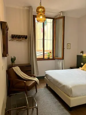 Letto o letti in una camera di Affittacamere Zanobi 45