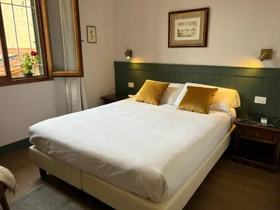 Letto o letti in una camera di Affittacamere Zanobi 45