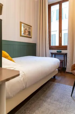 Letto o letti in una camera di Affittacamere Zanobi 45