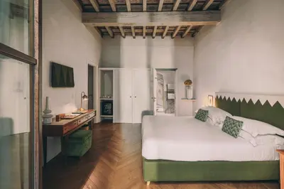 Letto o letti in una camera di Casa G. Firenze