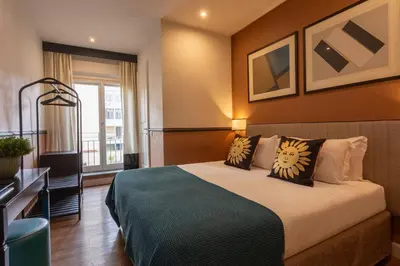 Letto o letti in una camera di Boutique Hotel Hugo