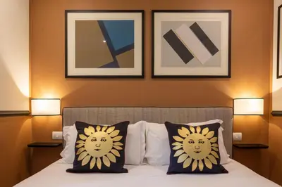 Letto o letti in una camera di Boutique Hotel Hugo