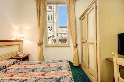 Letto o letti in una camera di Hotel De Lanzi