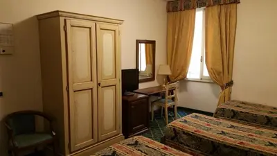 Letto o letti in una camera di Hotel De Lanzi