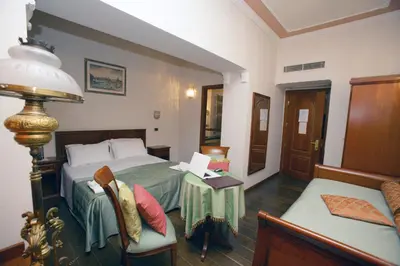 Letto o letti in una camera di Domus Florentiae Hotel