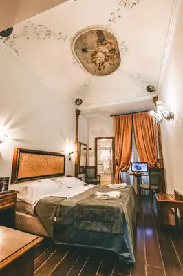 Letto o letti in una camera di Domus Florentiae Hotel