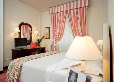 Letto o letti in una camera di Hotel De La Ville