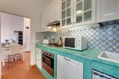 Cucina o angolo cottura di Maddalena Apartment by Mamo Florence