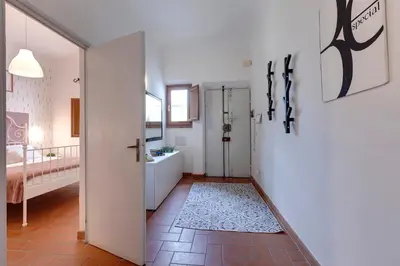 Letto o letti in una camera di Maddalena Apartment by Mamo Florence