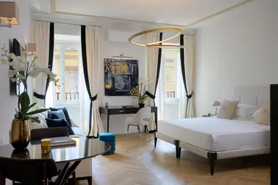 Letto o letti in una camera di Tornabuoni Suites Collection Residenza D'Epoca