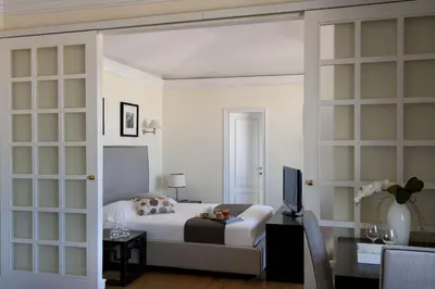 Letto o letti in una camera di Tornabuoni Suites Collection Residenza D'Epoca