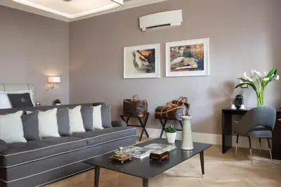 Area soggiorno di Tornabuoni Suites Collection Residenza D'Epoca