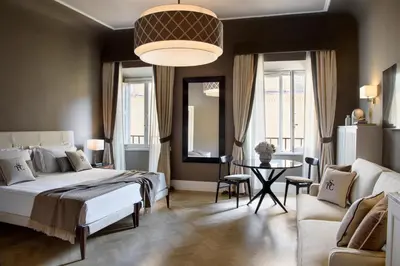 Letto o letti in una camera di Tornabuoni Suites Collection Residenza D'Epoca