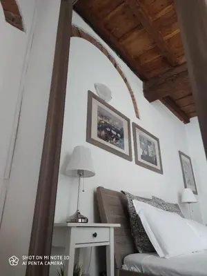 Letto o letti in una camera di Dante's Relais