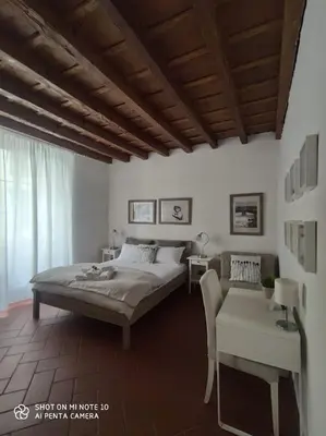 Letto o letti in una camera di Dante's Relais
