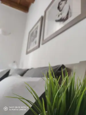 Letto o letti in una camera di Dante's Relais