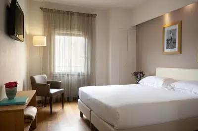 Letto o letti in una camera di Relais Piazza Signoria
