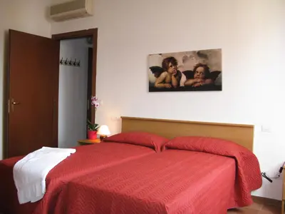 Letto o letti in una camera di Mio Hotel Firenze