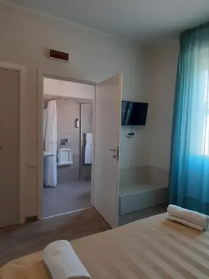 Letto o letti in una camera di Mio Hotel Firenze