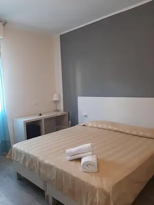 Letto o letti in una camera di Mio Hotel Firenze
