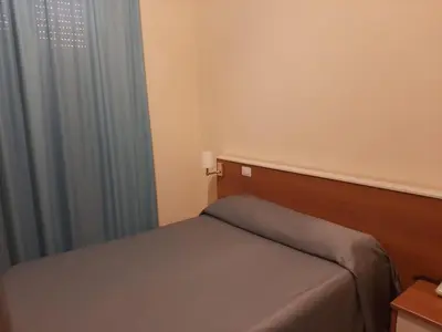 Letto o letti in una camera di Mio Hotel Firenze
