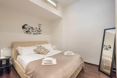 Letto o letti in una camera di Art Gallery Apartment in Florence