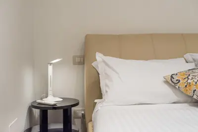Letto o letti in una camera di Art Gallery Apartment in Florence