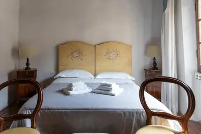 Letto o letti in una camera di Comfy Apartment Near Palazzo Pitti