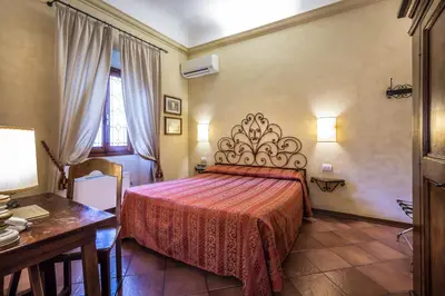 Letto o letti in una camera di Hotel Mario's