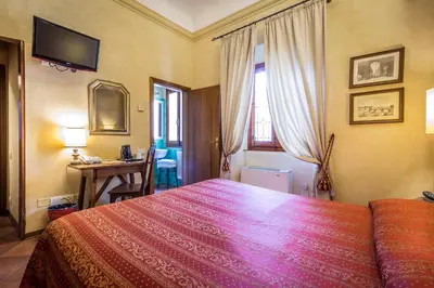 Letto o letti in una camera di Hotel Mario's