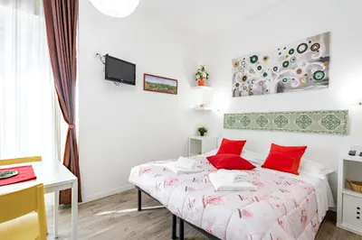 Letto o letti in una camera di GuestHost - Fortezza Studios