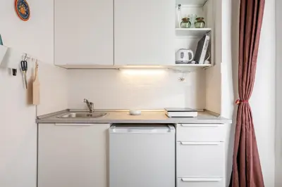 Cucina o angolo cottura di GuestHost - Fortezza Studios