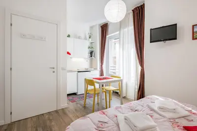 Letto o letti in una camera di GuestHost - Fortezza Studios