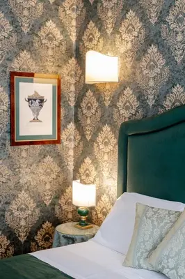 Letto o letti in una camera di Hotel Palazzo dal Borgo