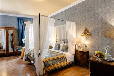 Letto o letti in una camera di Hotel Palazzo dal Borgo
