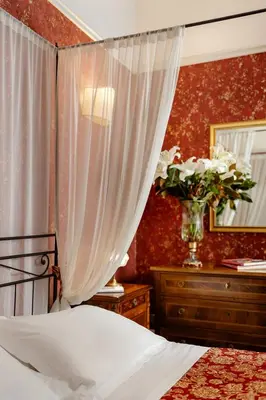 Letto o letti in una camera di Hotel Palazzo dal Borgo