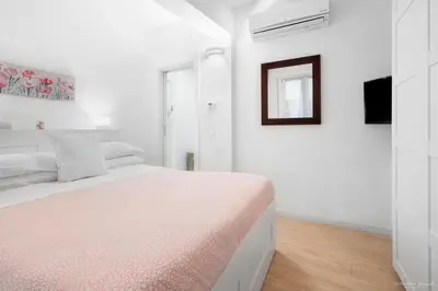 Letto o letti in una camera di Wine Apartments Florence Masseto