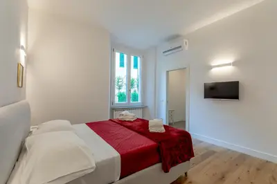 Letto o letti in una camera di Florence Michelangelo Suite Apartment