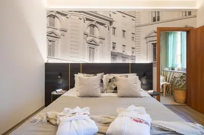 Letto o letti in una camera di Hotel Mia Cara & Spa