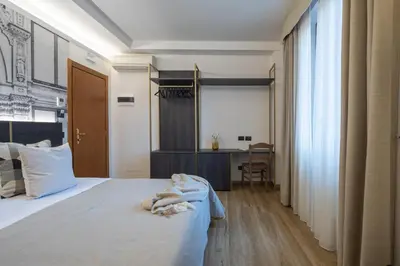 Letto o letti in una camera di Hotel Mia Cara & Spa
